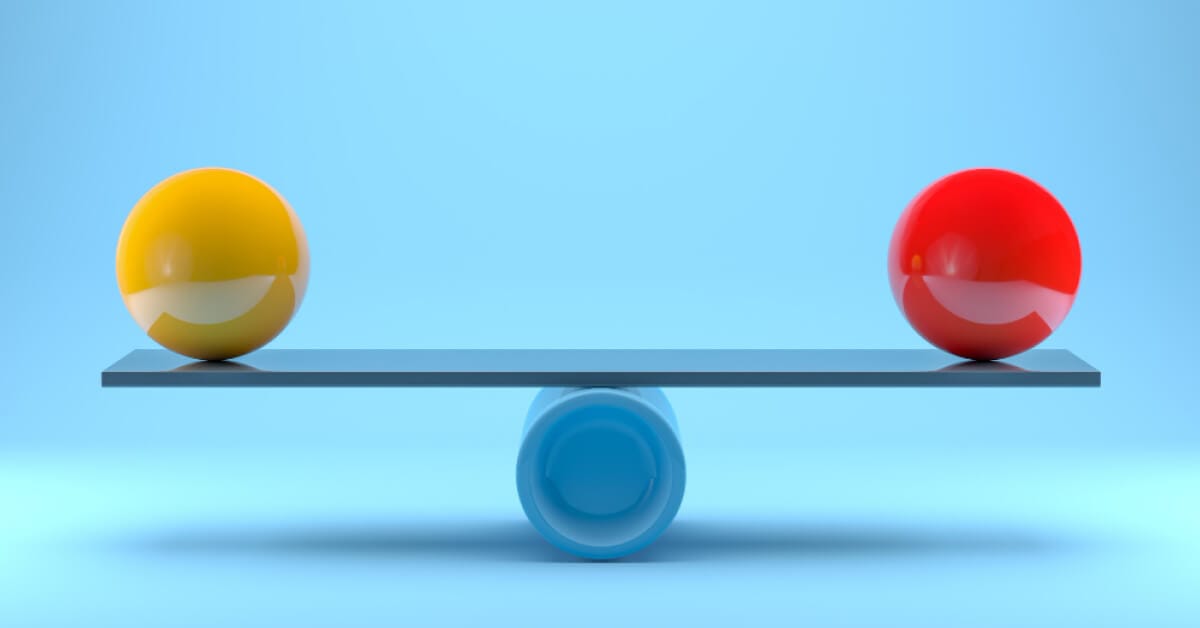 Red and yellow balls been balanced perfectly 