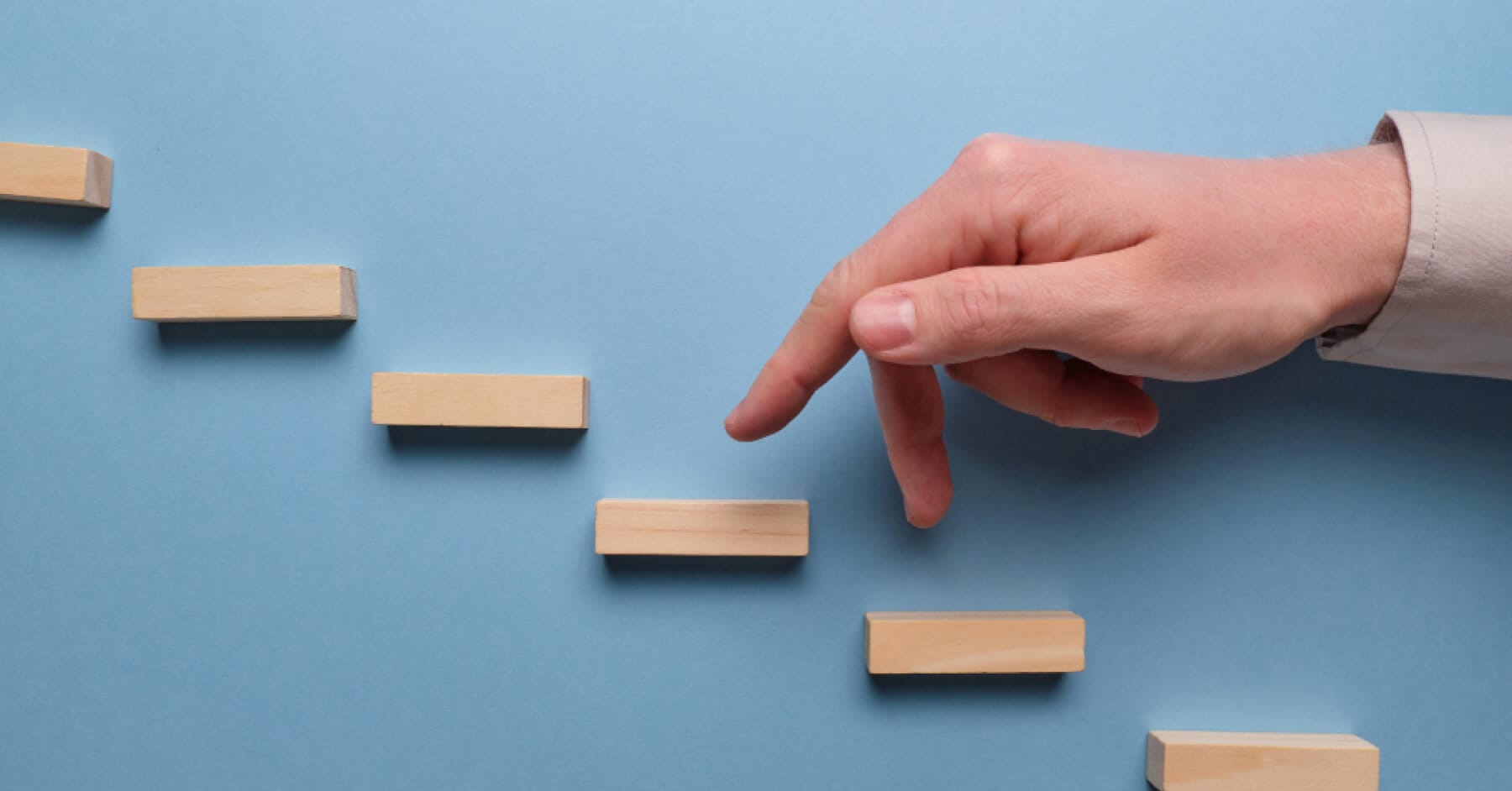 hand showing, climbing wooden stairs structure 