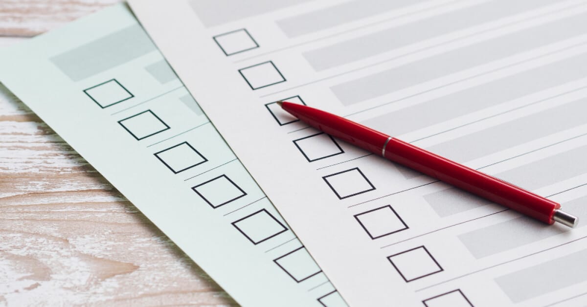 A pen of a checklist