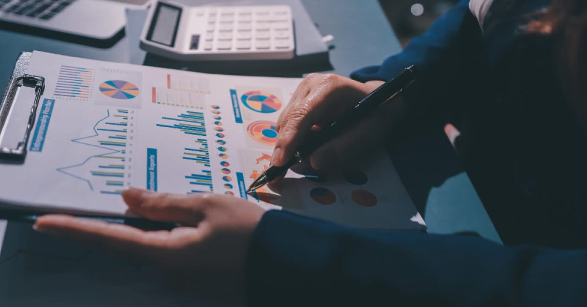 a person analyzing a stat on paper