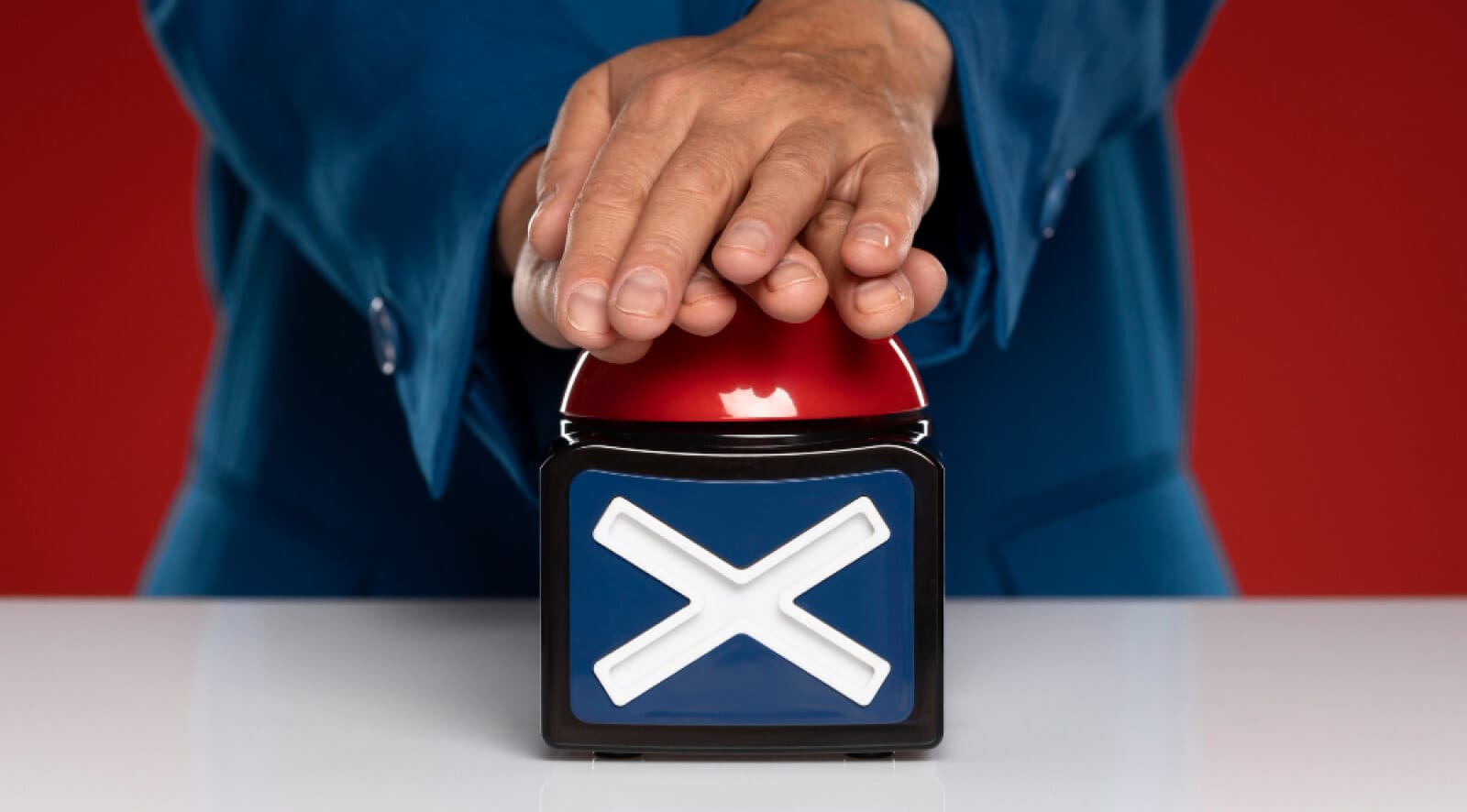 A person pushing down a worng button